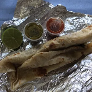Barbacoa burrito with lime and choice of regular or spicy sauce.