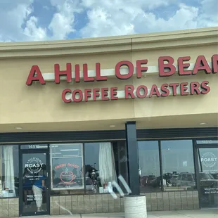 Look for this sign. Sorry it's a slightly crooked picture. I'm holding my coffee