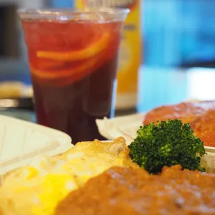 Grilled chicken with meat sauce spaghetti, and iced ribena with lemon