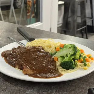 Pork steak with black pepper sauce