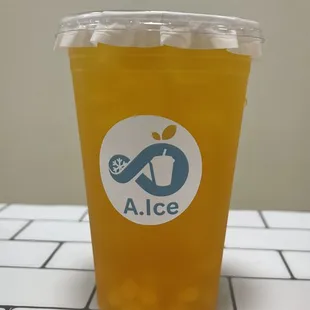 Mango green tea with mango agar boba