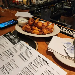 a plate of chicken wings