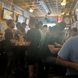  people sitting at a bar