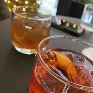  a glass of old fashioned cocktail