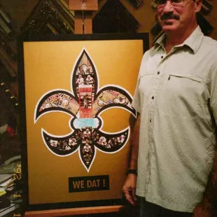 Custom collage piece for a client who brought in Saints tickets and requested a fleur de lis made of the tickets.