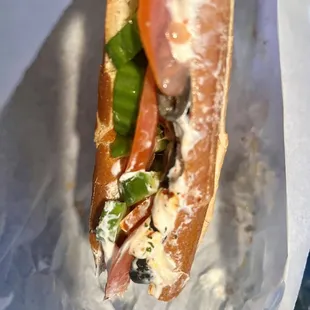 Vegetarian friendly, Lebanese Style Lebni sandwich. Lebni spread, Cucumbers, tomatoes, black olives, dried mint, &amp; Aleppo pepper. So good!