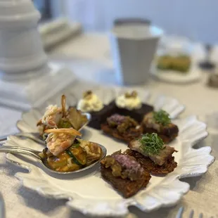 Zucchini Noodles, Puree of Roasted Garlic and Tomato Confit, Roasted Fennel, Poached Shrimp with Parmesan and Garlic Chips