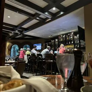 Packed bar of golfers