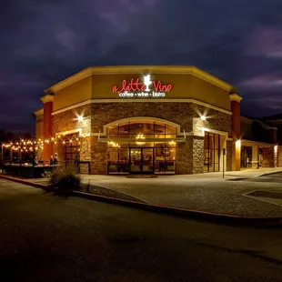 the outside of a restaurant at night