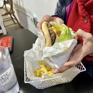The cheese burger, she managed half and took it home.
