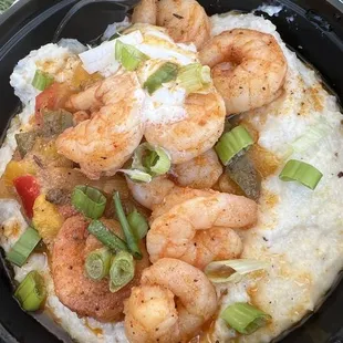 a bowl of shrimp and grits