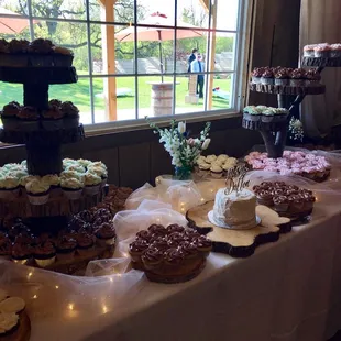 A Little Slice Of Heaven-- Lynn&apos;s cupcake display at our wedding was amazing and so beautiful!!!