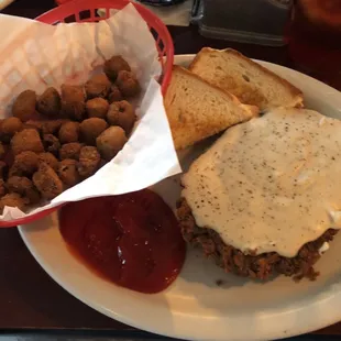 COUNTRY FRIED STEAK SMOTHERED IN COUNTRY GRAVY