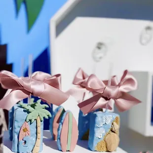 surfboard beach dessert buffet bar surf theme surfin birthday party seashell treat table marquee number Rice Krispies palm tree pastel girl