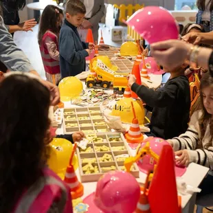 Construction theme patch station patching 3rd birthday party kids ideas event planner Central Valley hard hat tool belt little builders