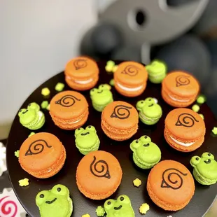 Naruto 10th birthday party Shippuden shuriken dessert bar buffet Uzumaki narutomaki Oreos hidden leaf macarons organic balloon garland
