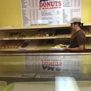  a man in a donut shop