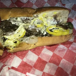 a sandwich with onions and cheese