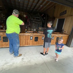 New shooting gallery with animatronics and themed elements.