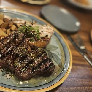 $45 12oz ribeye, sausage, rosemary chicken, and roasted potatoes very worth it!!!