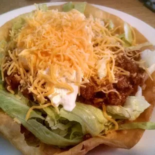 a taco salad on a white plate