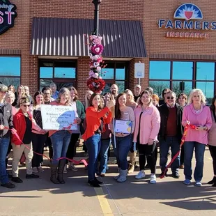 Ribbon cutting ceremony at new location