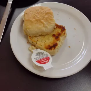 a plate of food with a sandwich on it