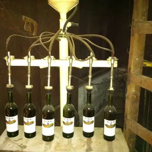An old bottler in the winery, still hooked up.
