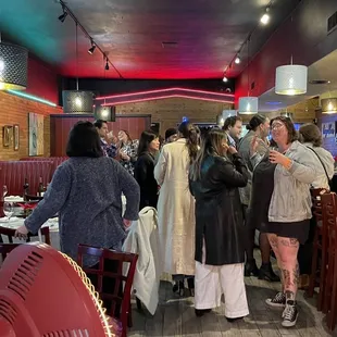 a group of people in a restaurant