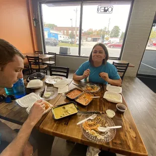 a man and a woman eating