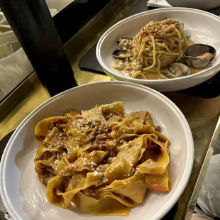 Bolognese and spaghetti neri alle vongole