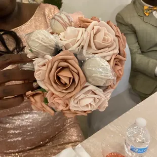 Cake pops blending into my matron of honors bouquet.