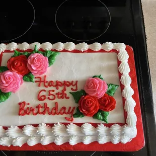 Very pretty cake with delicious frosting, but dry.