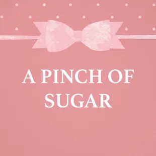 a pink background with a bow