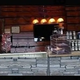 I love the pine log dining room &amp; stone checkout counter