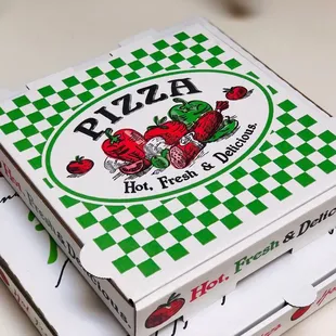 a pizza box on a table