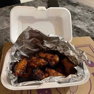 chicken wings wrapped in foil