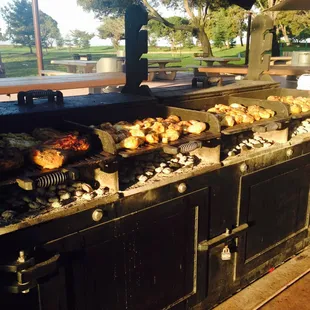 Oh there are more grills on the other side going. A Plus Catering is cooking for over 200 people!!
