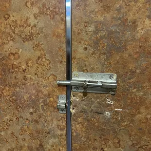 The locks on the bathroom doors.