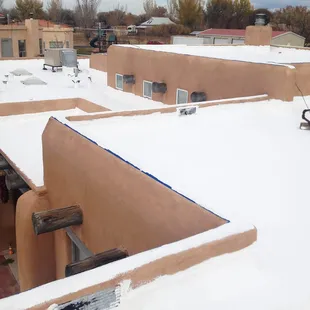 Ever wonder how our lines are so clean? We make sure that every parapet coating job is tastefully taped off to avoid any glare.