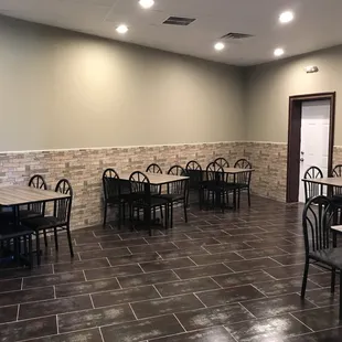  restaurant with tables and chairs