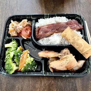 a bento box of food