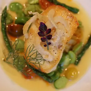 Alaskan Halibut, fingerling potatoes, asparagus spears, fava beans and fried fennel.