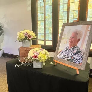 Two clusters of flowers. We did not want to visually overpower the picture. Various heights. Perfect collections. Two was the right number.