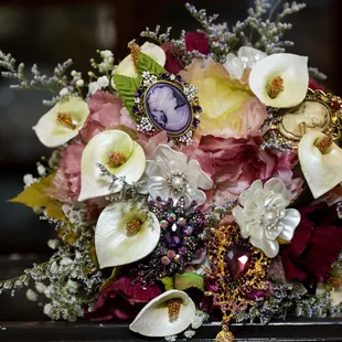 Jessica's Bouquet make with antique broaches and paper flowers so she may keep the memory for ever