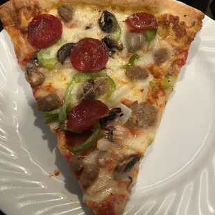 Supreme pizza slice