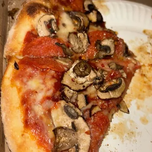 Personal pepperoni and mushroom pizza.
