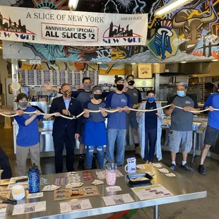 15 year anniversary dough cutting ceremony