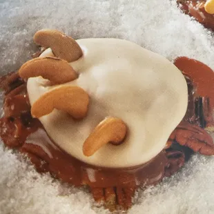 Fudge Bear Claw with white chocolate, caramel, pecans, chocolate and cashews