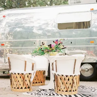 Our Airstream Lounges create a cozy place for guest to interact &amp; mingle Styled by Atelier de la Fleur. Photo by Tara Lienen